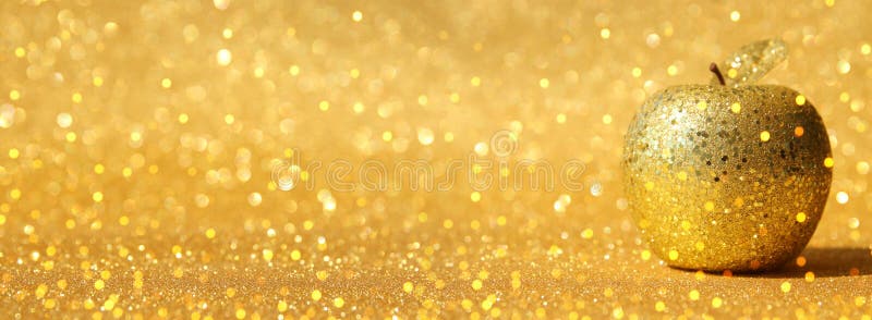 Hashanah di Rosh & x28; holiday& ebreo x29 del nuovo anno; concetto Simbolo tradizionale, mela decorativa dell'oro di scintillio fotografie stock Hashanah di Rosh & x28; holiday& ebreo x29 del nuovo anno; concetto Simbolo tradizionale, mela decorativa dell'oro di scintillio fotografie stock
