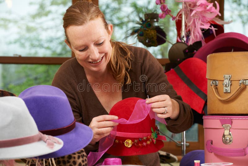 Hat Maker Working on Design in Studio Stock Photo - Image of smiling ...