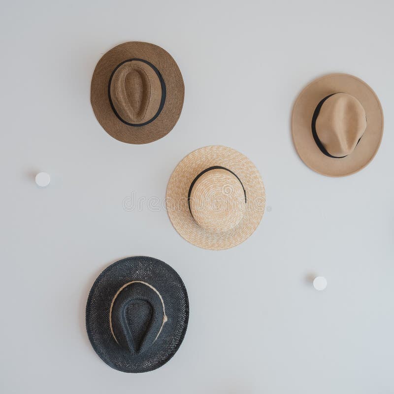 Hats hanging on wall stock photo. Image of design, isolated 