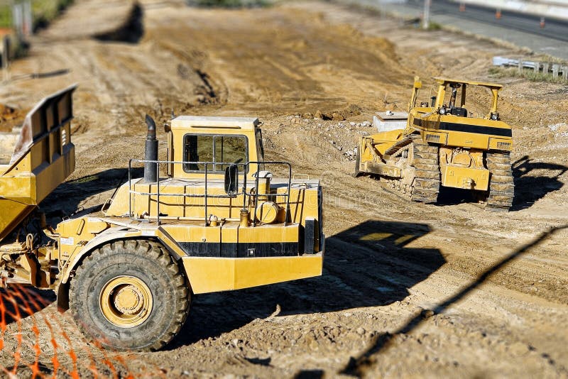 Hauler and Bulldozer on Construction Site Stock Photo Image of