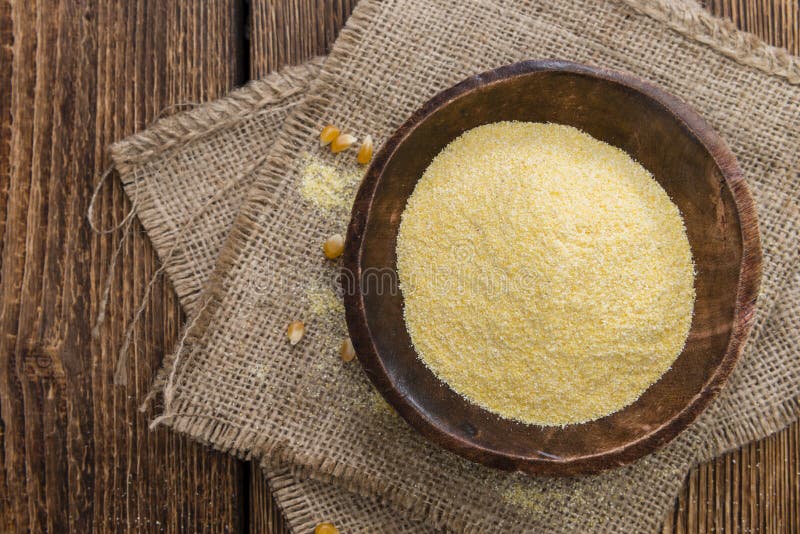 Heap of fresh Cornmeal as detailed close-up shot. Heap of fresh Cornmeal as detailed close-up shot