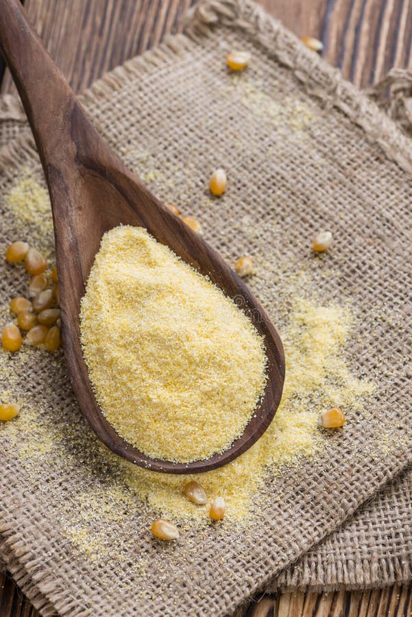 Heap of fresh Cornmeal as detailed close-up shot. Heap of fresh Cornmeal as detailed close-up shot