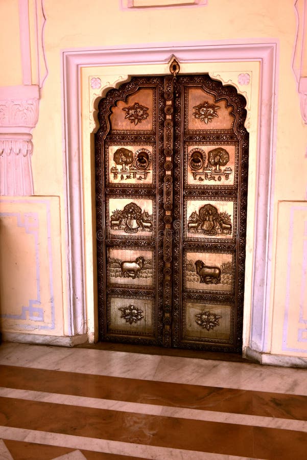 The palace of Jaipur, erected in 1799 on the initiative of the Sawai Pratapa Singh maharaja, is a perfect example of Rajputs architecture. A red sandstone monument with a monumental façade stood at one of the main streets of Jaipur to allow the court lady to observe the everyday life of the city. In the form of a crown of Krishna, a Hindu god. Its appearance resembles a honeycomb. It is located in the heart of the business center of Jaipur. Historical places of sight seeing family friends. The palace of Jaipur, erected in 1799 on the initiative of the Sawai Pratapa Singh maharaja, is a perfect example of Rajputs architecture. A red sandstone monument with a monumental façade stood at one of the main streets of Jaipur to allow the court lady to observe the everyday life of the city. In the form of a crown of Krishna, a Hindu god. Its appearance resembles a honeycomb. It is located in the heart of the business center of Jaipur. Historical places of sight seeing family friends