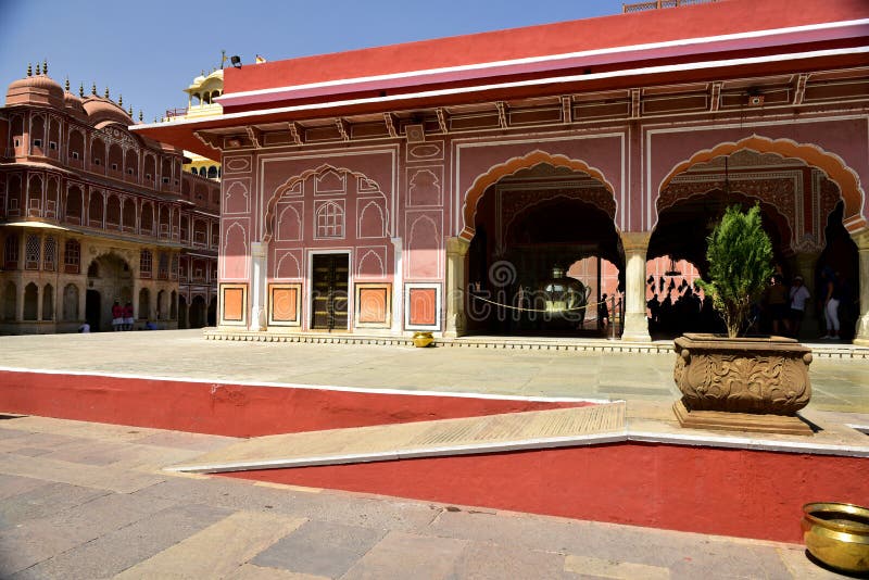 The palace of Jaipur, erected in 1799 on the initiative of the Sawai Pratapa Singh maharaja, is a perfect example of Rajputs architecture. A red sandstone monument with a monumental façade stood at one of the main streets of Jaipur to allow the court lady to observe the everyday life of the city. In the form of a crown of Krishna, a Hindu god. Its appearance resembles a honeycomb. It is located in the heart of the business center of Jaipur. Historical places of sight seeing family friends. The palace of Jaipur, erected in 1799 on the initiative of the Sawai Pratapa Singh maharaja, is a perfect example of Rajputs architecture. A red sandstone monument with a monumental façade stood at one of the main streets of Jaipur to allow the court lady to observe the everyday life of the city. In the form of a crown of Krishna, a Hindu god. Its appearance resembles a honeycomb. It is located in the heart of the business center of Jaipur. Historical places of sight seeing family friends