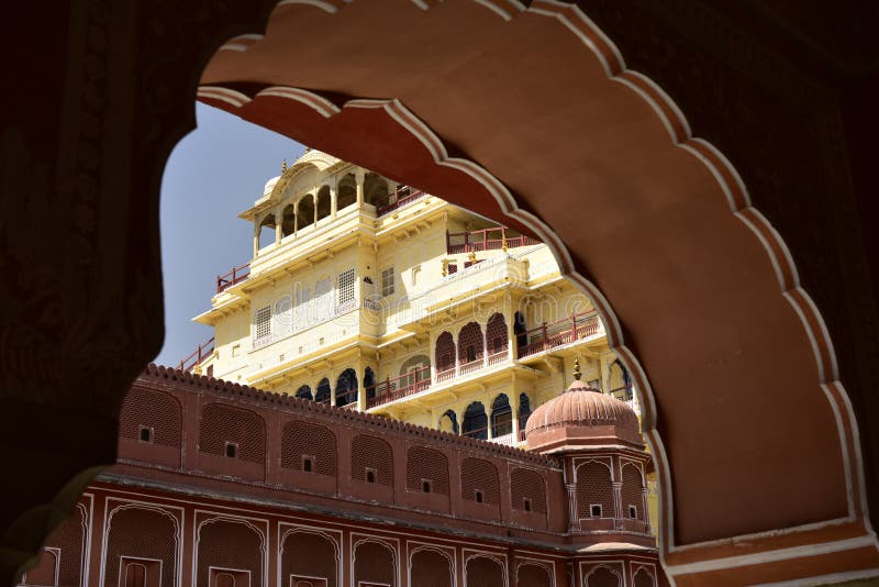 The palace of Jaipur, erected in 1799 on the initiative of the Sawai Pratapa Singh maharaja, is a perfect example of Rajputs architecture. A red sandstone monument with a monumental façade stood at one of the main streets of Jaipur to allow the court lady to observe the everyday life of the city. In the form of a crown of Krishna, a Hindu god. Its appearance resembles a honeycomb. It is located in the heart of the business center of Jaipur. Historical places of sight seeing family friends. The palace of Jaipur, erected in 1799 on the initiative of the Sawai Pratapa Singh maharaja, is a perfect example of Rajputs architecture. A red sandstone monument with a monumental façade stood at one of the main streets of Jaipur to allow the court lady to observe the everyday life of the city. In the form of a crown of Krishna, a Hindu god. Its appearance resembles a honeycomb. It is located in the heart of the business center of Jaipur. Historical places of sight seeing family friends
