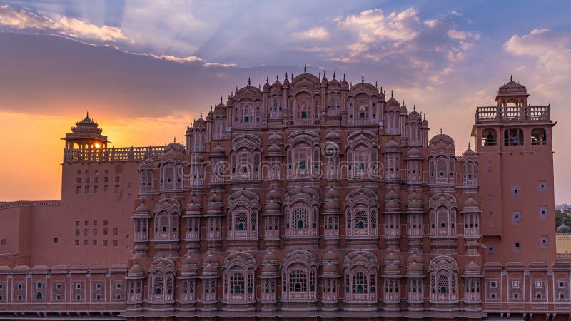 Hawa Mahal, Jaipur, Rajasthan, India, a five-tier harem wing of the palace complex of the Maharaja of Jaipur, built of pink sandstone in the form of the crown of Krishna, Palace of the Winds. Hawa Mahal, Jaipur, Rajasthan, India, a five-tier harem wing of the palace complex of the Maharaja of Jaipur, built of pink sandstone in the form of the crown of Krishna, Palace of the Winds.