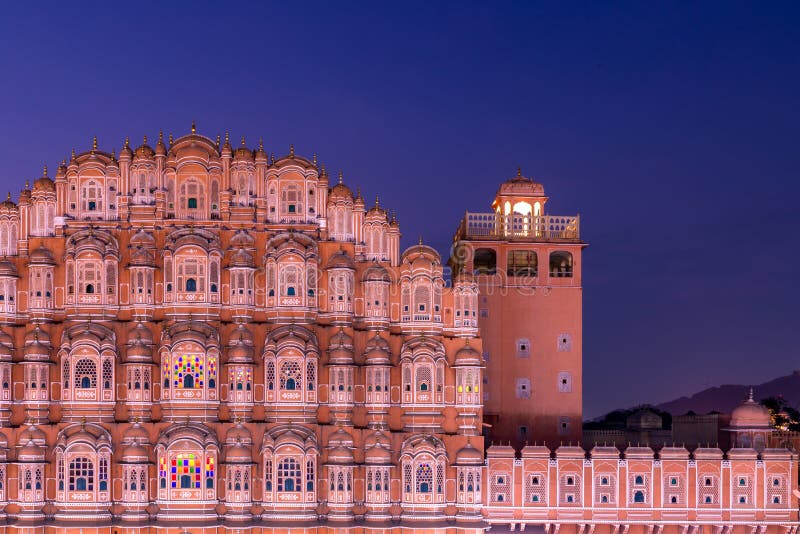 Hawa Mahal, Jaipur, Rajasthan, India, a five-tier harem wing of the palace complex of the Maharaja of Jaipur, built of pink sandstone in the form of the crown of Krishna, Palace of the Winds. Hawa Mahal, Jaipur, Rajasthan, India, a five-tier harem wing of the palace complex of the Maharaja of Jaipur, built of pink sandstone in the form of the crown of Krishna, Palace of the Winds.