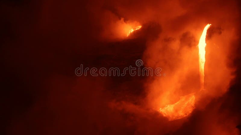 Hawaii Volcano eruption - flowing lava reaches ocean on volcanic eruption on Big Island, Hawaii. Lava stream flowing