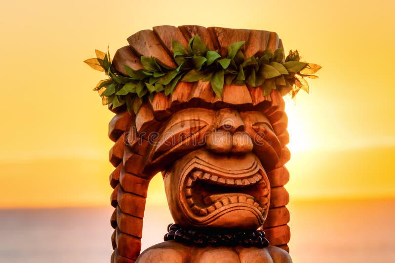 Hawaiian Tiki Statue during Sunrise a traditional image.