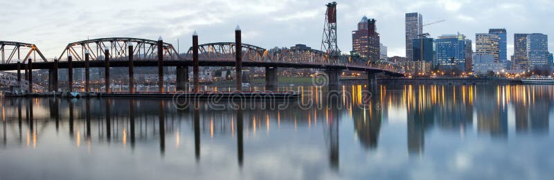 Hawthorne Bridge Over Willamette River at Dusk. Hawthorne Bridge Over Willamette River with Portland Oregon Downtown Skyline at Dusk Panorama stock photography Hawthorne Bridge Over Willamette River at Dusk. Hawthorne Bridge Over Willamette River with Portland Oregon Downtown Skyline at Dusk Panorama stock photography