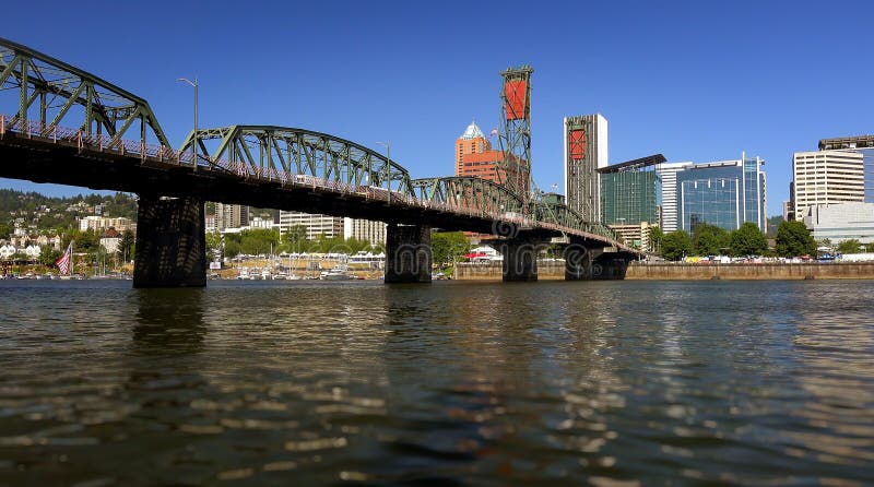 Hawthorne Bridge Over Willamette River in Portland, Oregon. The Hawthorne Bridge crosses over the Willamette River and leads into Portland, Oregon royalty free stock photography Hawthorne Bridge Over Willamette River in Portland, Oregon. The Hawthorne Bridge crosses over the Willamette River and leads into Portland, Oregon royalty free stock photography