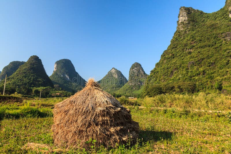 Hay Stack on the Land in a Rocky Hill Landscape Stock Image Image of