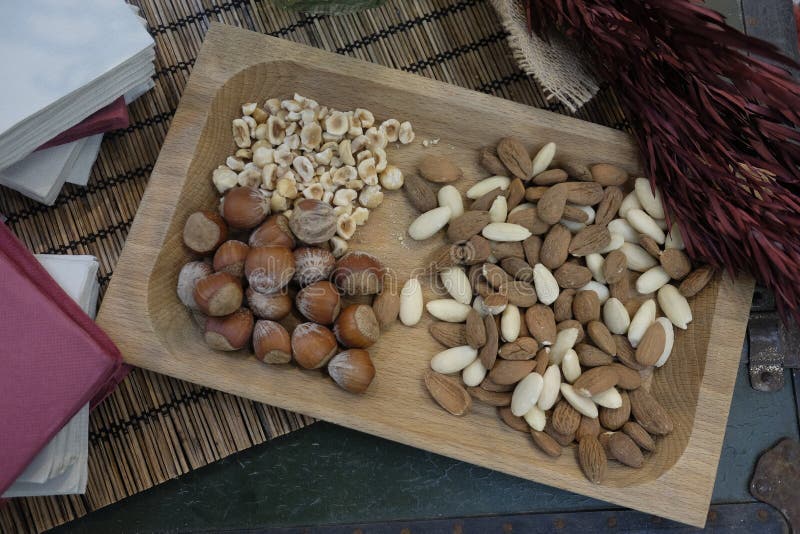 Hazelnuts and almonds stock photo. Image of food, protein 103798212