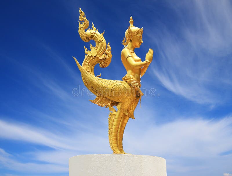In Buddhist mythology and Hindu mythology, a kinnara is a paradigmatic lover, a celestial musician, half-human and half-horse (India) or half-bird (south-east Asia). Their character is clarified in the Adi parva of the Mahabharata, where they say: We are everlasting lover and beloved. We never separate. We are eternally husband and wife; never do we become mother and father. No offspring is seen in our lap. We are lover and beloved ever-embracing. In between us we do not permit any third creature demanding affection. Our life is a life of perpetual pleasure.[1] They are also featured in a number of Buddhist texts, including the Lotus Sutra. An ancient Indian string instrument is known as the Kinnari Veena. In Southeast Asian mythology, Kinnaris, the female counterpart of Kinnaras, are depicted as half-bird, half-woman creatures. One of the many creatures that inhabit the mythical Himavanta. Kinnaris have the head, torso, and arms of a woman and the wings, tail and feet of a swan. She is renowned for her dance, song and poetry, and is a traditional symbol of feminine beauty, grace and accomplishment. In Buddhist mythology and Hindu mythology, a kinnara is a paradigmatic lover, a celestial musician, half-human and half-horse (India) or half-bird (south-east Asia). Their character is clarified in the Adi parva of the Mahabharata, where they say: We are everlasting lover and beloved. We never separate. We are eternally husband and wife; never do we become mother and father. No offspring is seen in our lap. We are lover and beloved ever-embracing. In between us we do not permit any third creature demanding affection. Our life is a life of perpetual pleasure.[1] They are also featured in a number of Buddhist texts, including the Lotus Sutra. An ancient Indian string instrument is known as the Kinnari Veena. In Southeast Asian mythology, Kinnaris, the female counterpart of Kinnaras, are depicted as half-bird, half-woman creatures. One of the many creatures that inhabit the mythical Himavanta. Kinnaris have the head, torso, and arms of a woman and the wings, tail and feet of a swan. She is renowned for her dance, song and poetry, and is a traditional symbol of feminine beauty, grace and accomplishment.