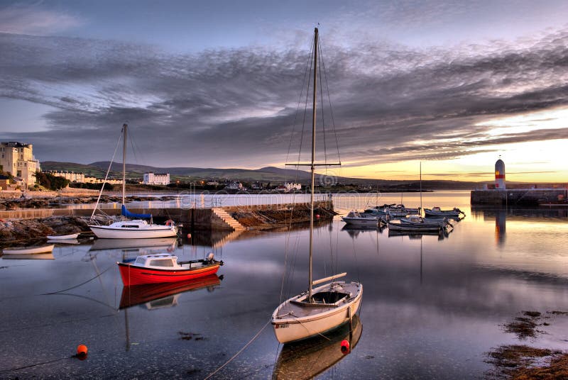 HDR - Boats in Harbour with Lighthouse stock photo