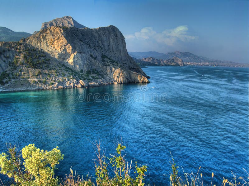 Hdr image of sea landscape with clouds and bay