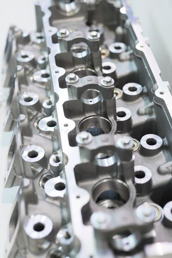 The Cylinder Head of the Internal Combustion Engine. Isolated on White