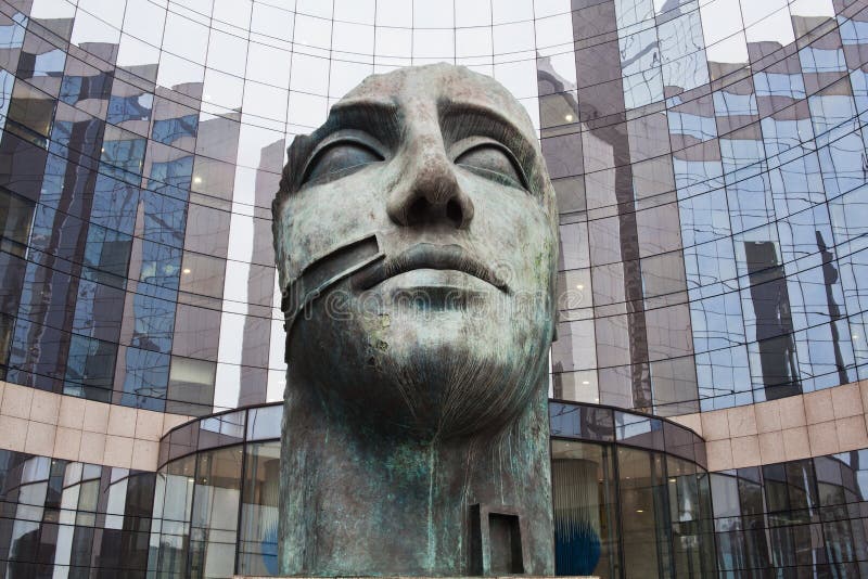 Head Sculpture in Front of a Glass Facade Stock Photo Image of front