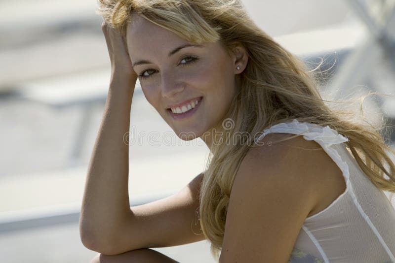 Head shot of a smiling glamorous woman stock photo