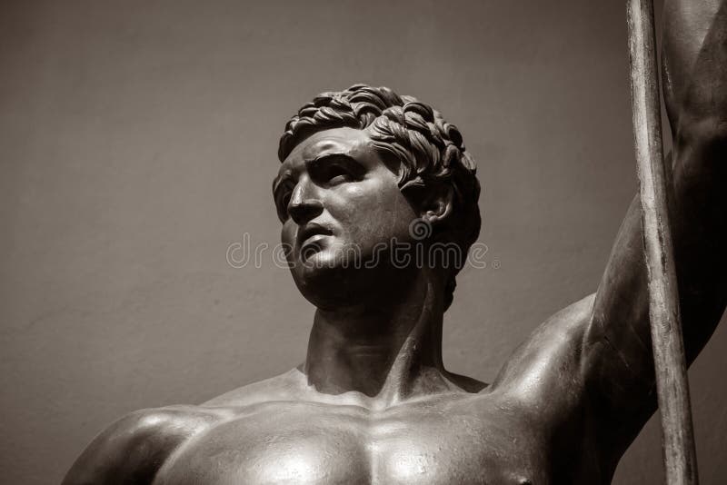 Head and shoulders detail of the ancient sculpture