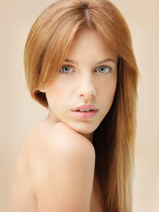 Head and shoulders portrait of beautiful woman