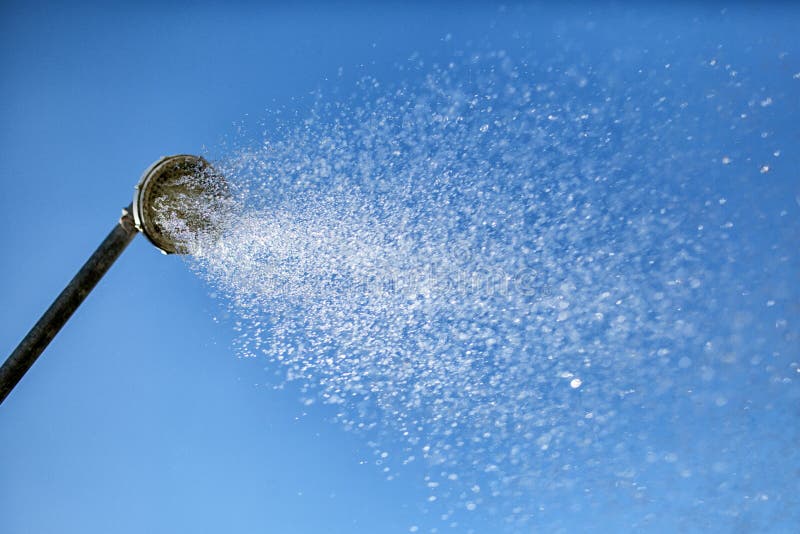 Head shower in a blue sky stock photography Head shower in a blue sky stock photography