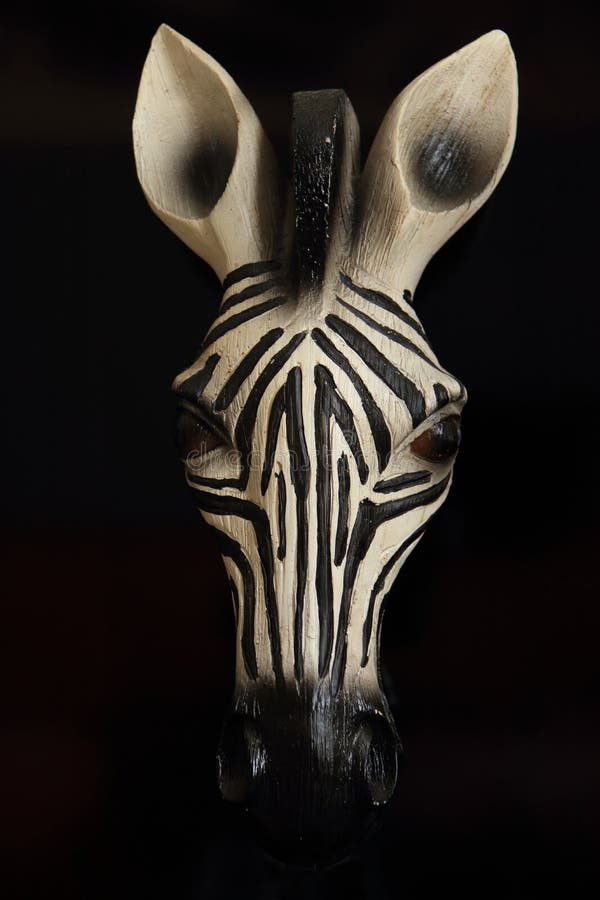 Wood carved zebra head