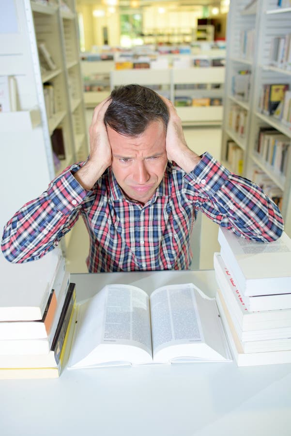 Headache cause by reading stock photo. Image of read 124189128