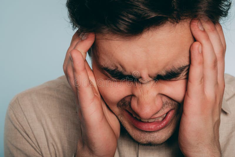 Headache stress anger fury man emotional breakdown royalty free stock photography Headache stress anger fury man emotional breakdown royalty free stock photography
