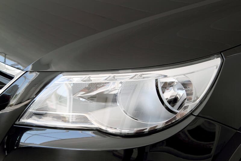 Headlight of a Black Classic Retro American Car.the Front Lights of the