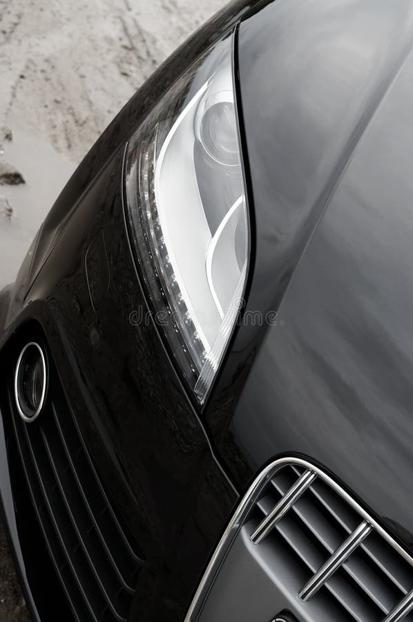 Car with Its Lights on in the Garage Stock Photo Image of motion
