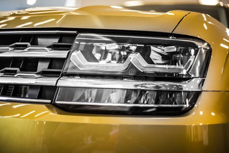 Headlight of Large SUV Modern Car with Led and Xenon Optics Stock Image