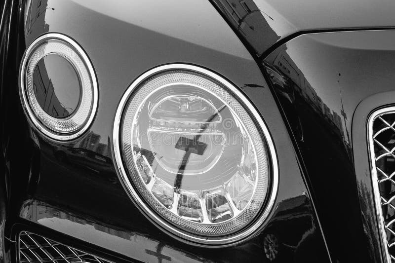 Headlights of black car stock image. Image of modern 138538691