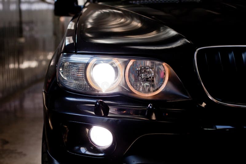 Headlights of Black Car. Garage Theme Stock Photo Image of