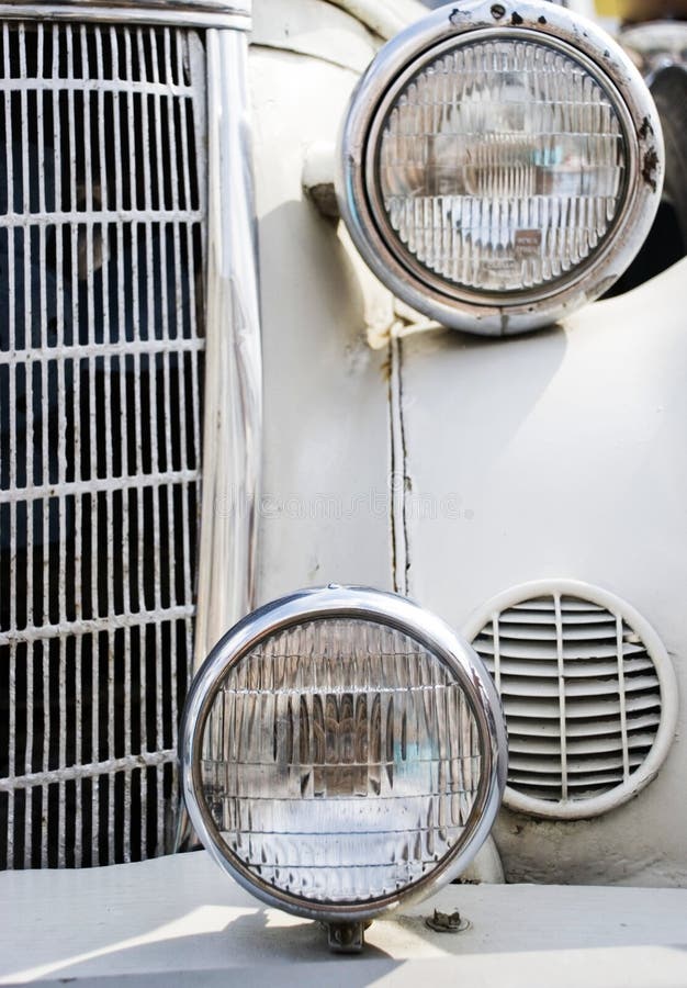 The Headlights and Grille. Antique Car. Stock Image - Image of grille