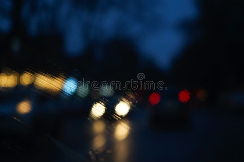 Blurry Headlight Backgrounds. Headlights of an Car, Blurred by