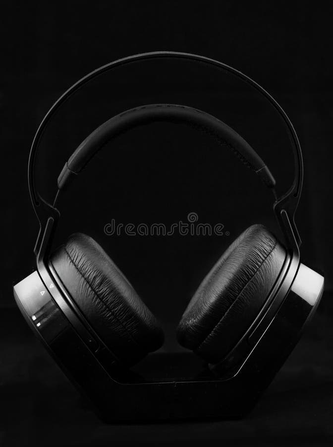 Headphones and Disco Waves Isolated on Black Background Stock Photo