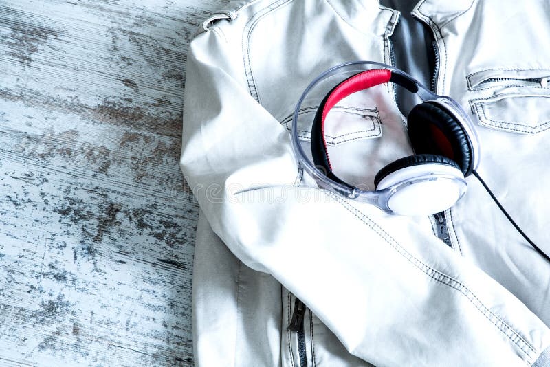 Headphones on a White Jacket Stock Image Image of modern, gear 53792871
