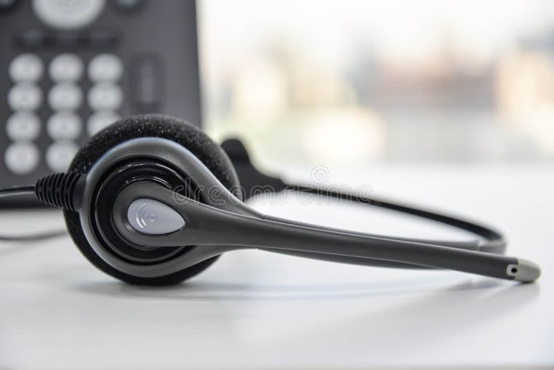 Headset and the IP Phone royalty free stock photography Headset and the IP Phone royalty free stock photography
