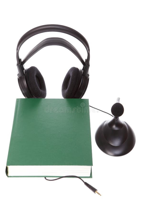 Headset with microphone, hardcover book isolated