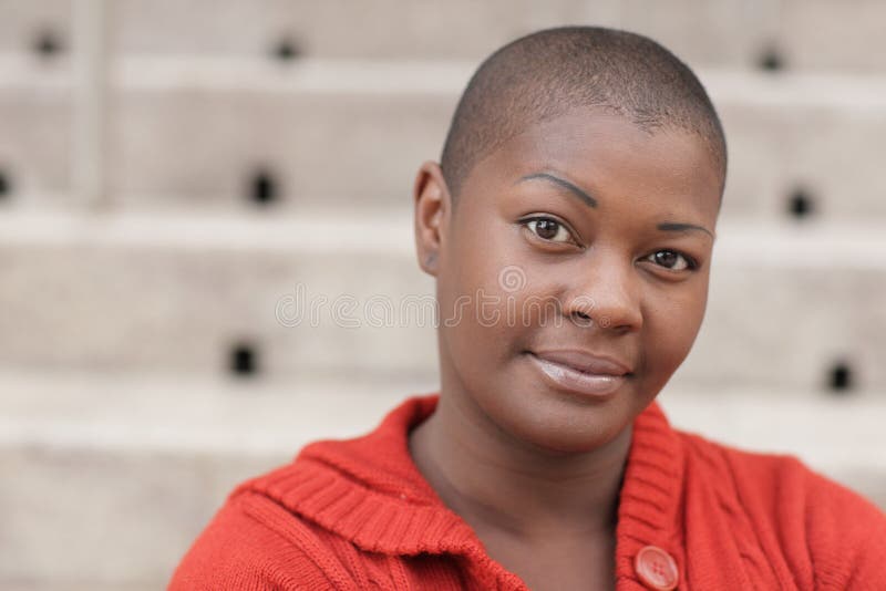 Headshot of a bald black woman