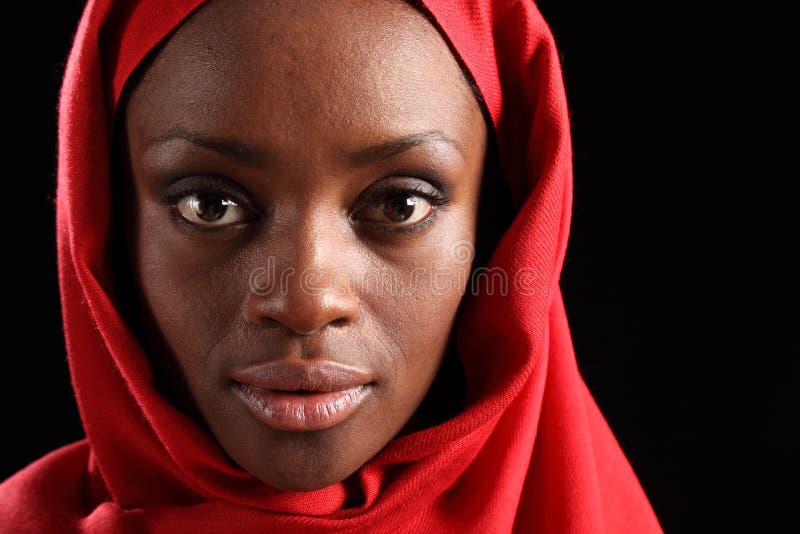 Headshot beautiful black african woman in hijab