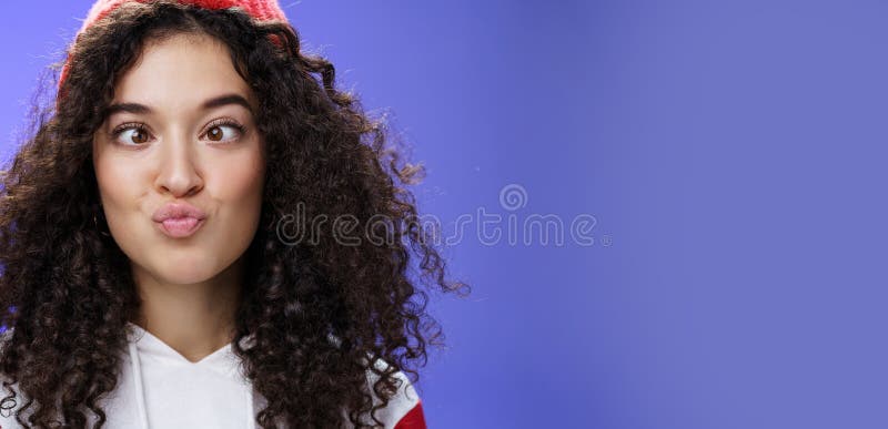 Headshot Of Funny And Playful Girl Fooling Around Making Faces Not