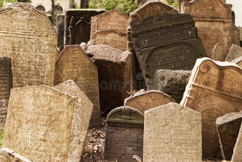 A view of part of the Josefov cemetery in the old ghetto of Prague. The Jewish cemetery, with the uneven headstones carved in Hebrew, represents centuries of history that has been preserved. A view of part of the Josefov cemetery in the old ghetto of Prague. The Jewish cemetery, with the uneven headstones carved in Hebrew, represents centuries of history that has been preserved.