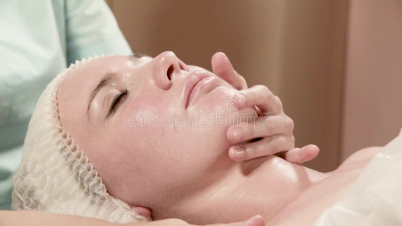 Health Beauty Resort And Relaxation Concept Beautiful Woman In Spa Salon Getting Face