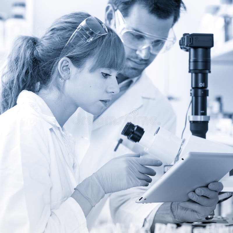 Health Care Researchers Working in Scientific Laboratory. Stock Photo