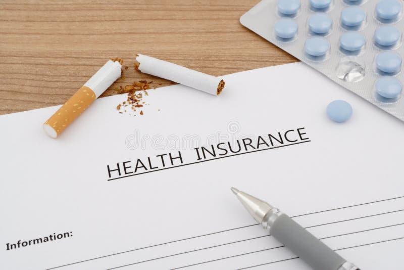 Health insurance document with pills and broken cigarette