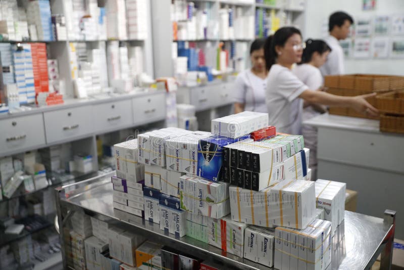 Hospital pharmacy. Pharmacists at work. Tam Duc Cardiology Hospital.. Ho Chi Minh City. Vietnam. Hospital pharmacy. Pharmacists at work. Tam Duc Cardiology Hospital.. Ho Chi Minh City. Vietnam