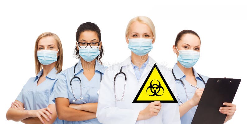 Female doctor and nurses with biohazard sign royalty free stock photography Female doctor and nurses with biohazard sign royalty free stock photography