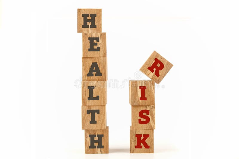 Health and Risk word written on cube shape. stock photos
